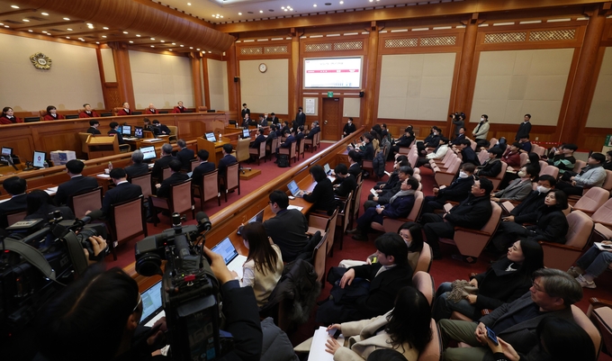 21일 서울 종로구 헌법재판소에서 열린 윤석열 대통령 탄핵심판 3차 변론기일. 사진=뉴시스
